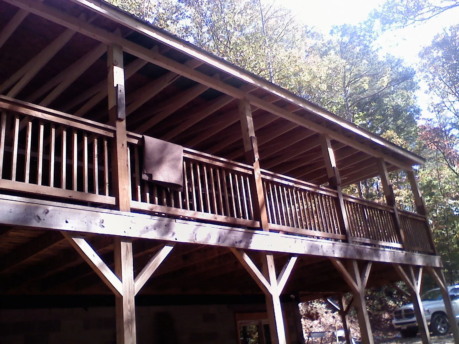 Timber framing under a new elevated porch and deck — Roof Leak Repair in Copemish by Roofing Brothers
